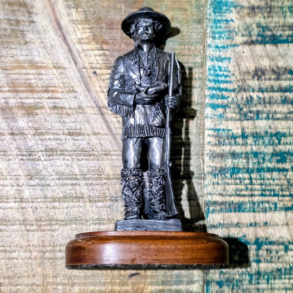 Vintage western frontiersman / trapper statue